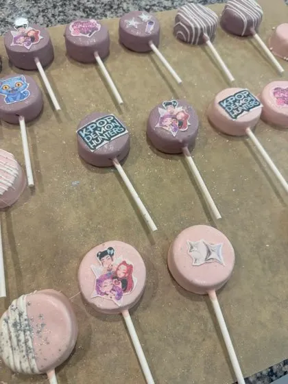 Custom K-Pop themed chocolate-dipped Oreo pops